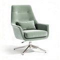 Swivel lounge chair in soft green fabric with metallic base and lumbar support