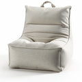 Lounge chair in light gray fabric with ergonomic shape and soft padding